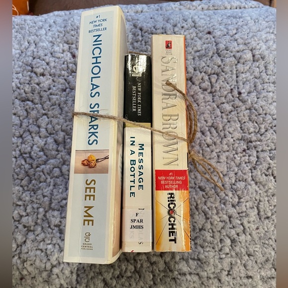 3) paper back books 2) Nicholas Sparks 1) Sandra Brown. Used - Picture 1 of 4